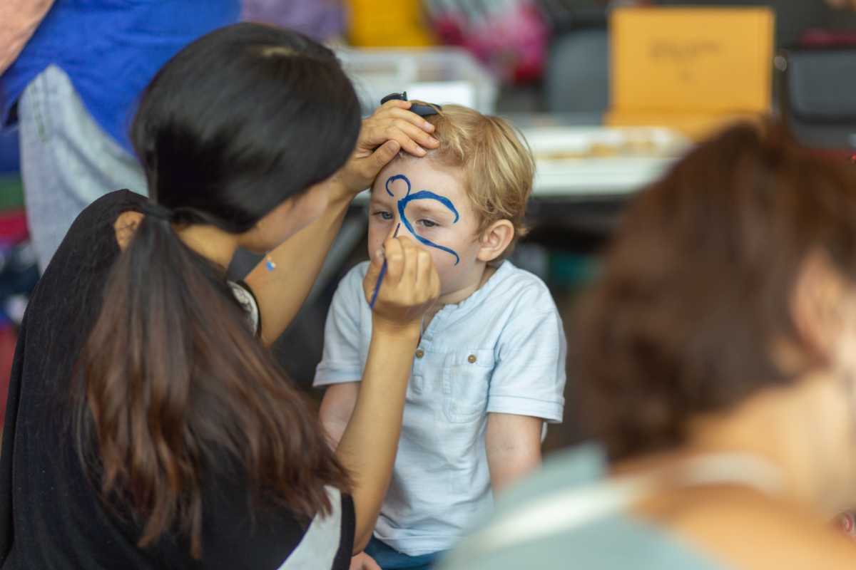 a child having his face painted